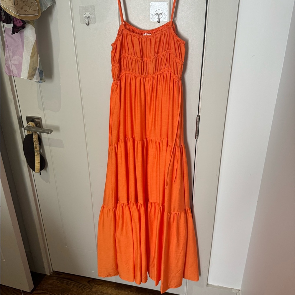 Flowy orange ruched maxi dress